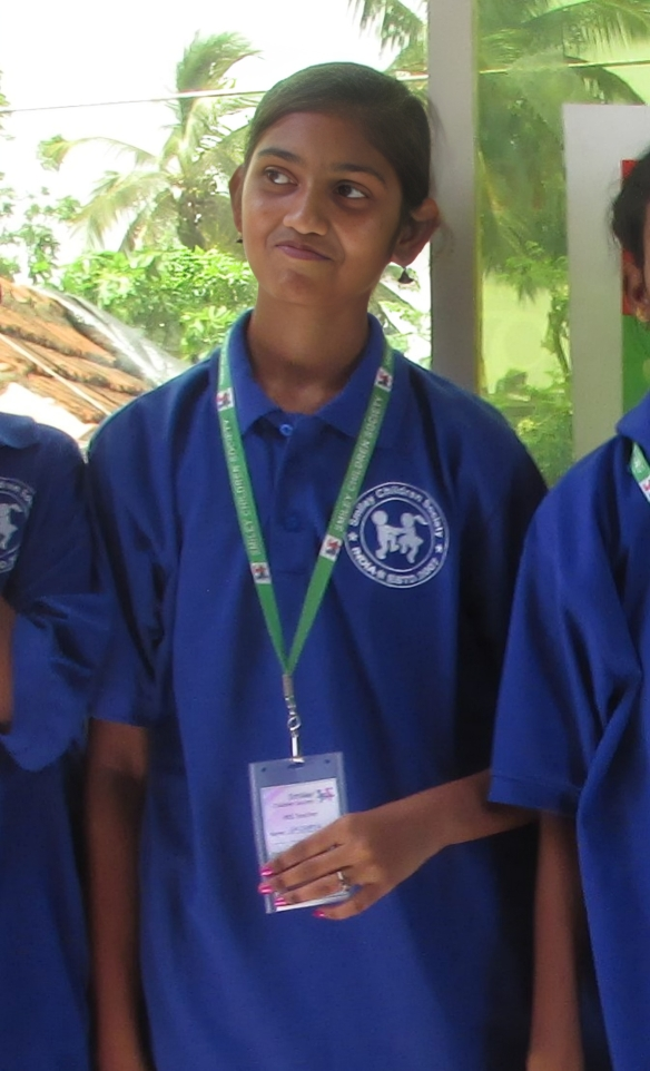 Smiley child volunteer